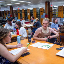 Individuals gathered around a table