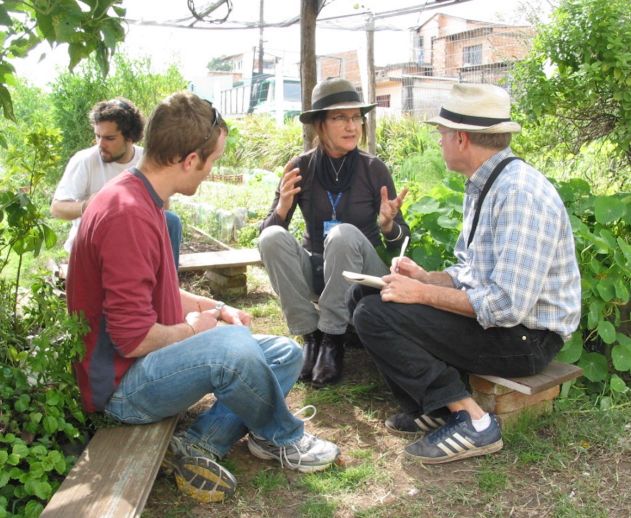 Students seated in a garden