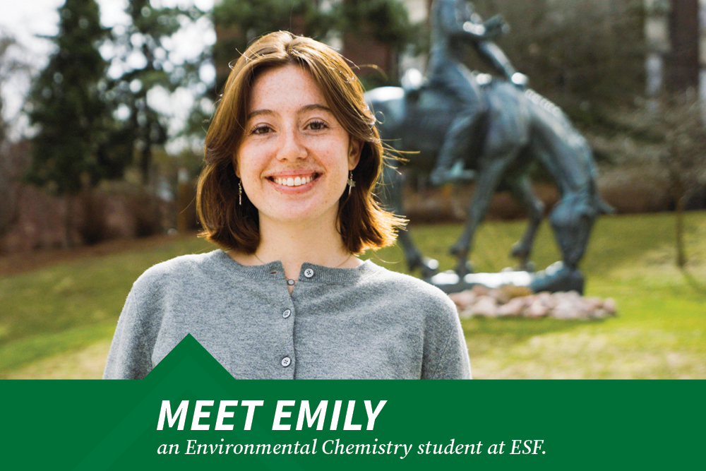 Headshot of female graduate student looking at the camera happy