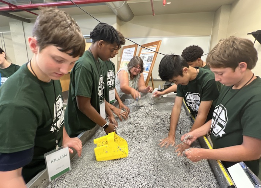 Kids working on hydrology table.